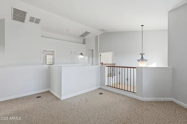 a view of a hallway with closet