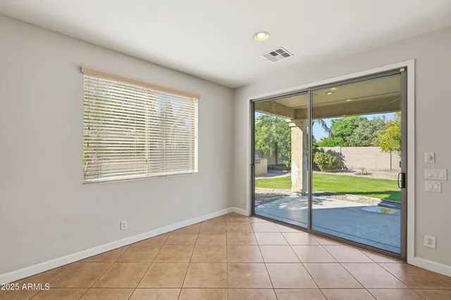 a view of an empty room with a large window