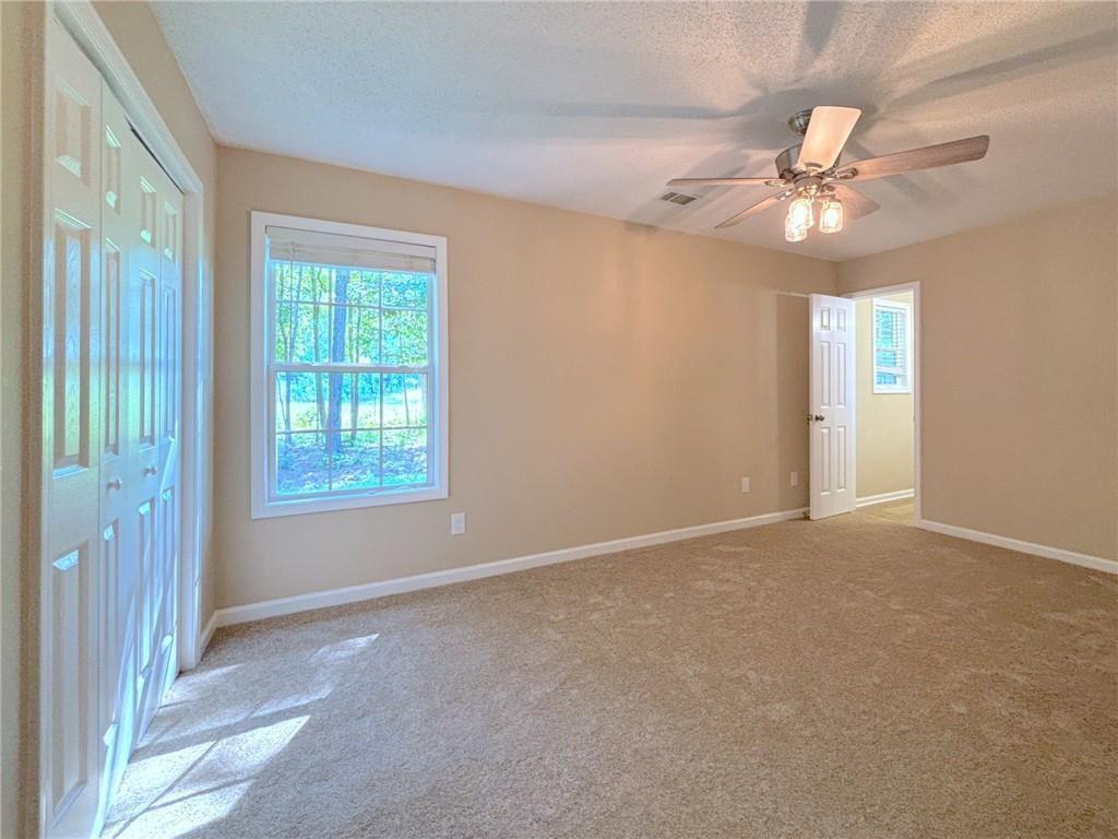 413 Old Brock Road Rockmart, GA 30153 - Photo 15 of 27 a view of an empty room with a window
