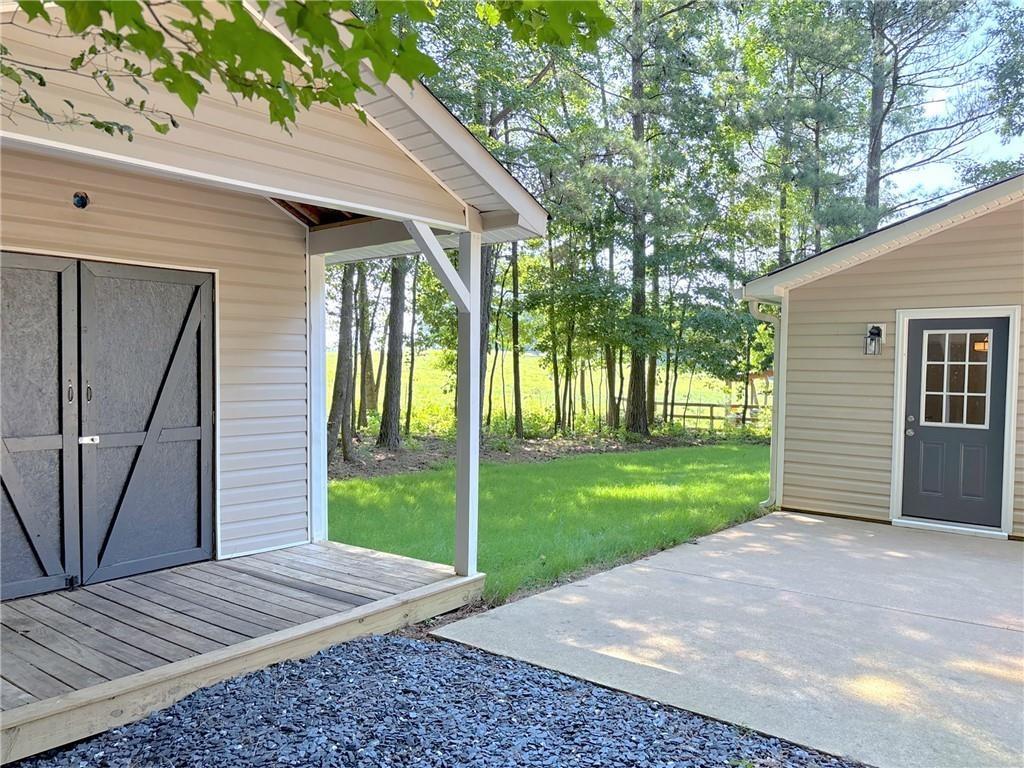 413 Old Brock Road Rockmart, GA 30153 - Photo 2 of 27 a view of a back yard of the house