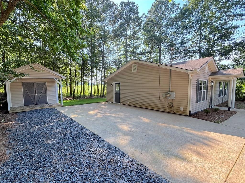 413 Old Brock Road Rockmart, GA 30153 - Photo 23 of 27 a house with a yard