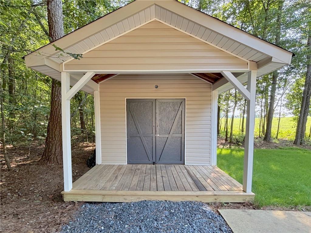 413 Old Brock Road Rockmart, GA 30153 - Photo 24 of 27 a front view of a house with garden