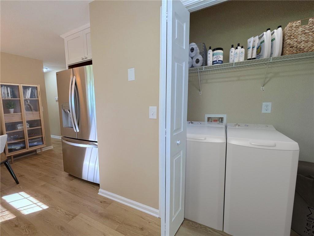 413 Old Brock Road Rockmart, GA 30153 - Photo 8 of 27 a view of cabinets and wooden floor
