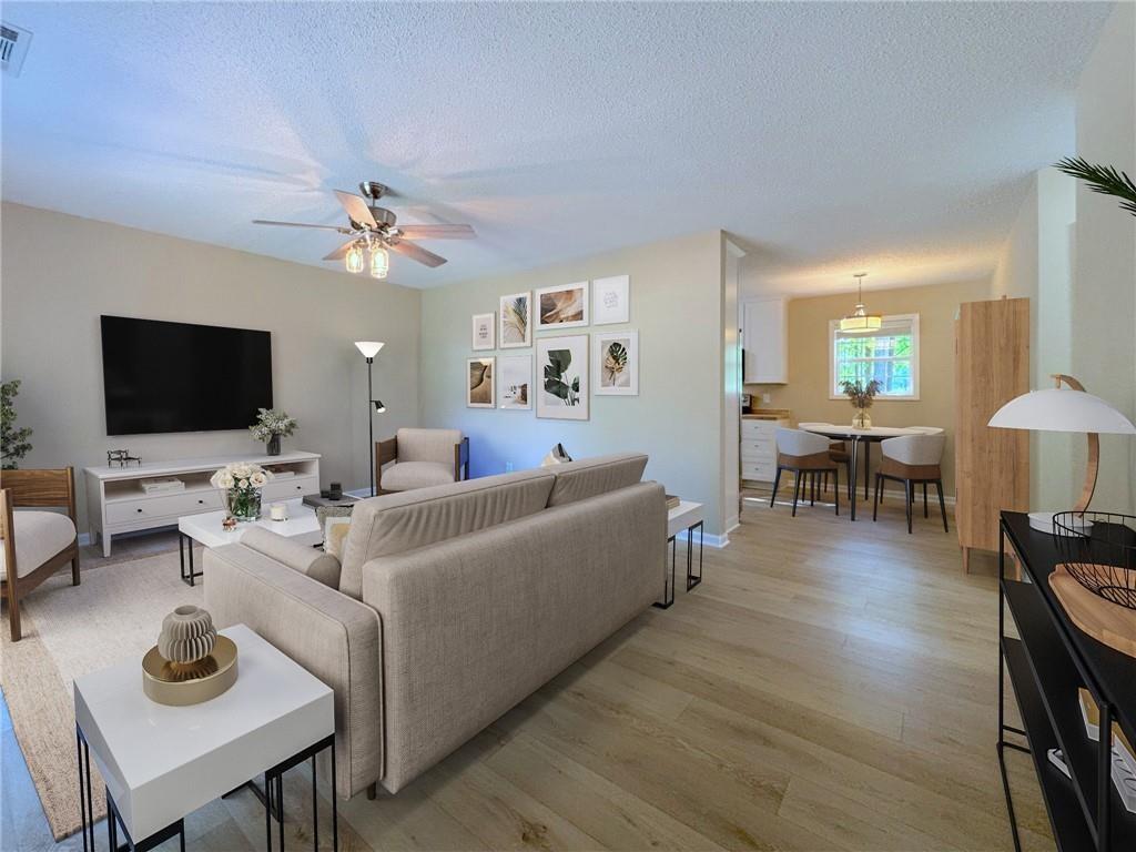 413 Old Brock Road Rockmart, GA 30153 - Photo 10 of 27 a living room with furniture and a flat screen tv