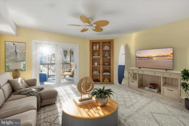 a kitchen with a table chairs refrigerator and cabinets