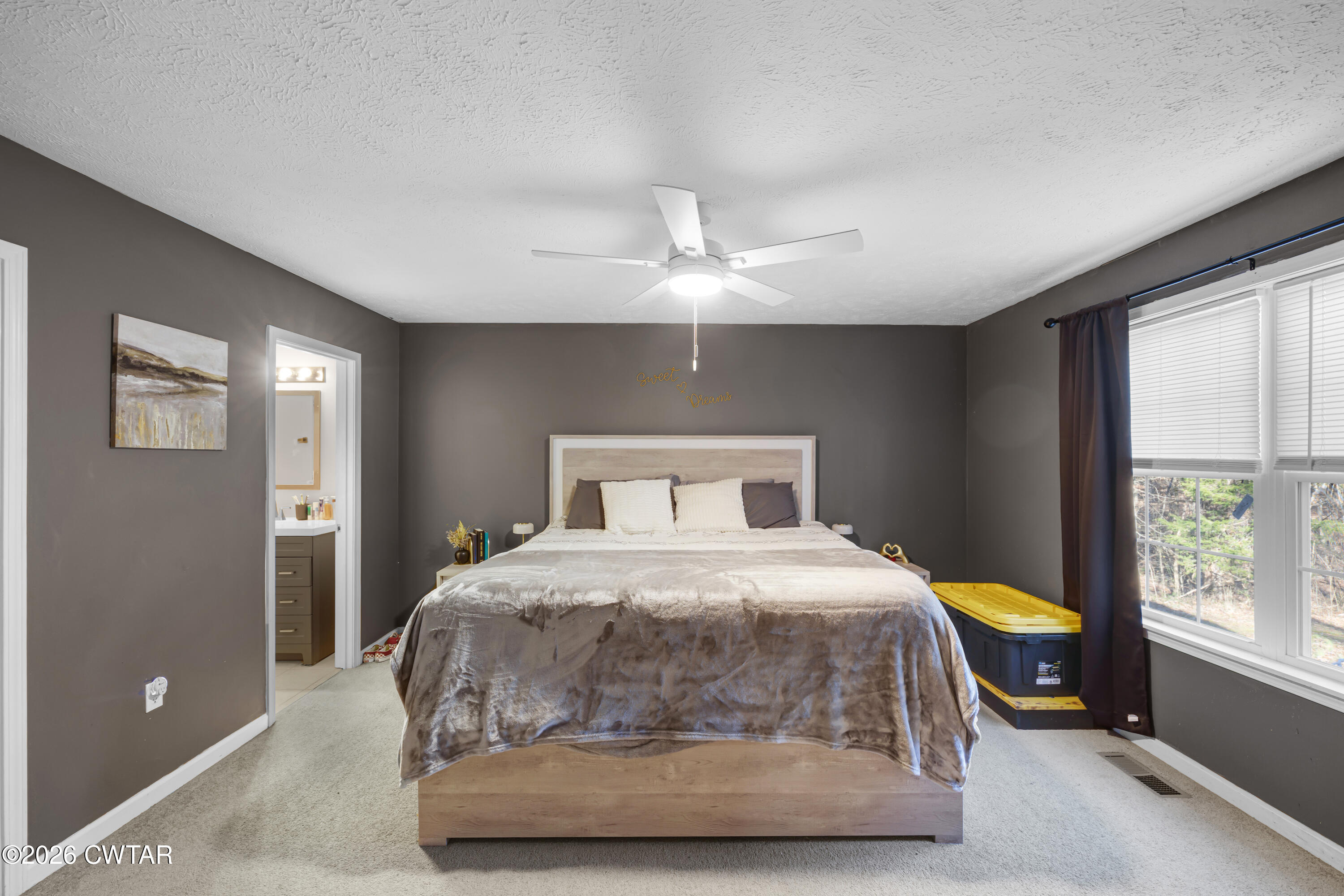 392 Howley Lane Cedar Grove, TN 38321 - Photo 11 of 14 a bedroom with a bed and a window