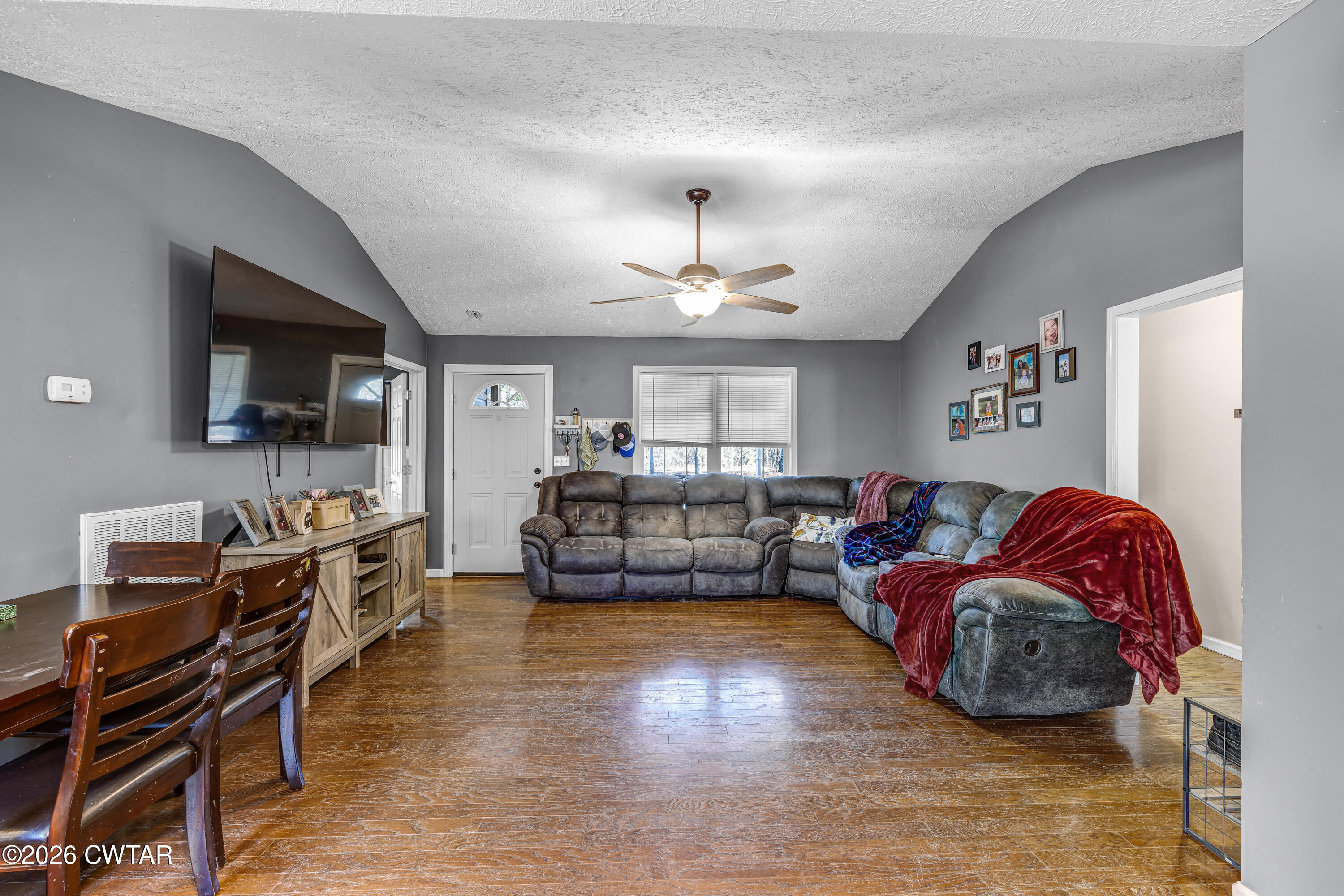 392 Howley Lane Cedar Grove, TN 38321 - Photo 5 of 14 a living room with furniture and a flat screen tv