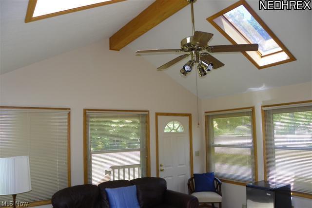 5838 Myers Road Akron, OH 44319 - Photo 10 of 16 Vaulted 4 Season sunroom w/ 2 skylights & access to tranquil back yard