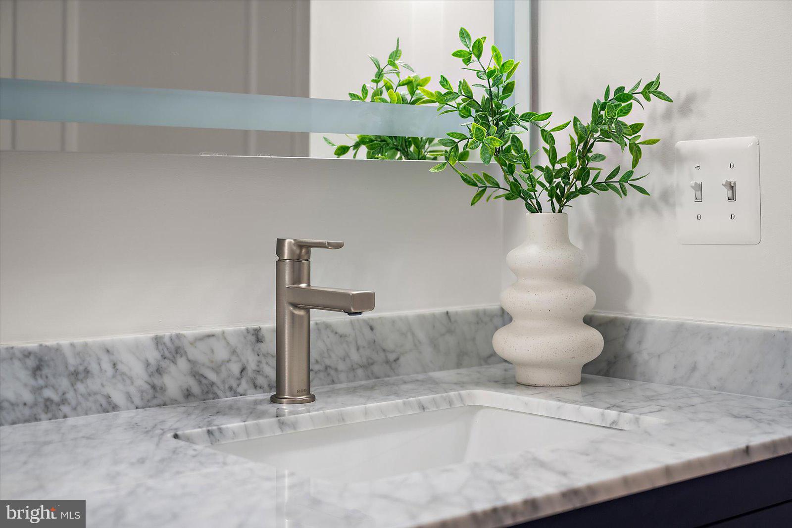 1118 Gum Bottom Road Crownsville, MD 21032 - Photo 32 of 52 Sleek marble vanity with modern accents.