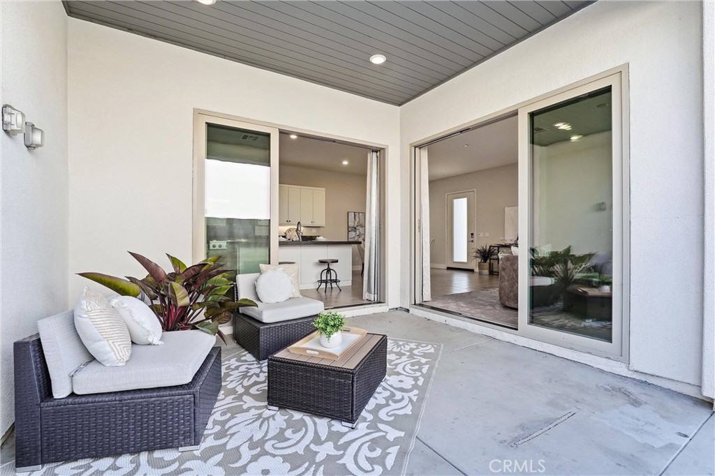 182 Scale Irvine, CA 92618 - Photo 23 of 61 Two sliders open to the kitchen and living room, keeping the conversation going under the stars.