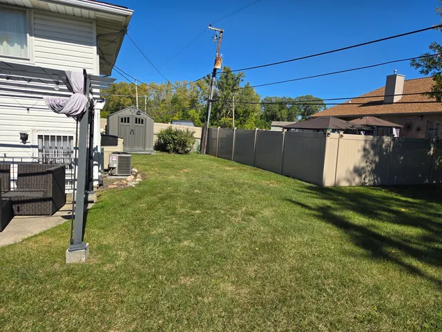 a view of a big room with table and chairs