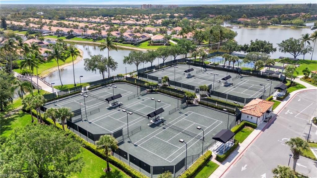4401 Novato Court Naples, FL 34109 - Photo 45 of 50 an aerial view of a city with lots of residential buildings