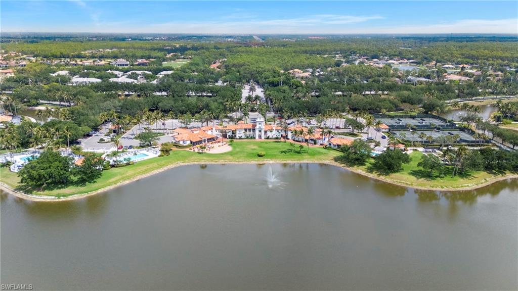 4401 Novato Court Naples, FL 34109 - Photo 50 of 50 an aerial view of a house with a garden and lake view