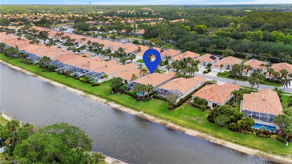 4401 Novato Court Naples, FL 34109 - Photo 5 of 50 an aerial view of residential houses with outdoor space and street view