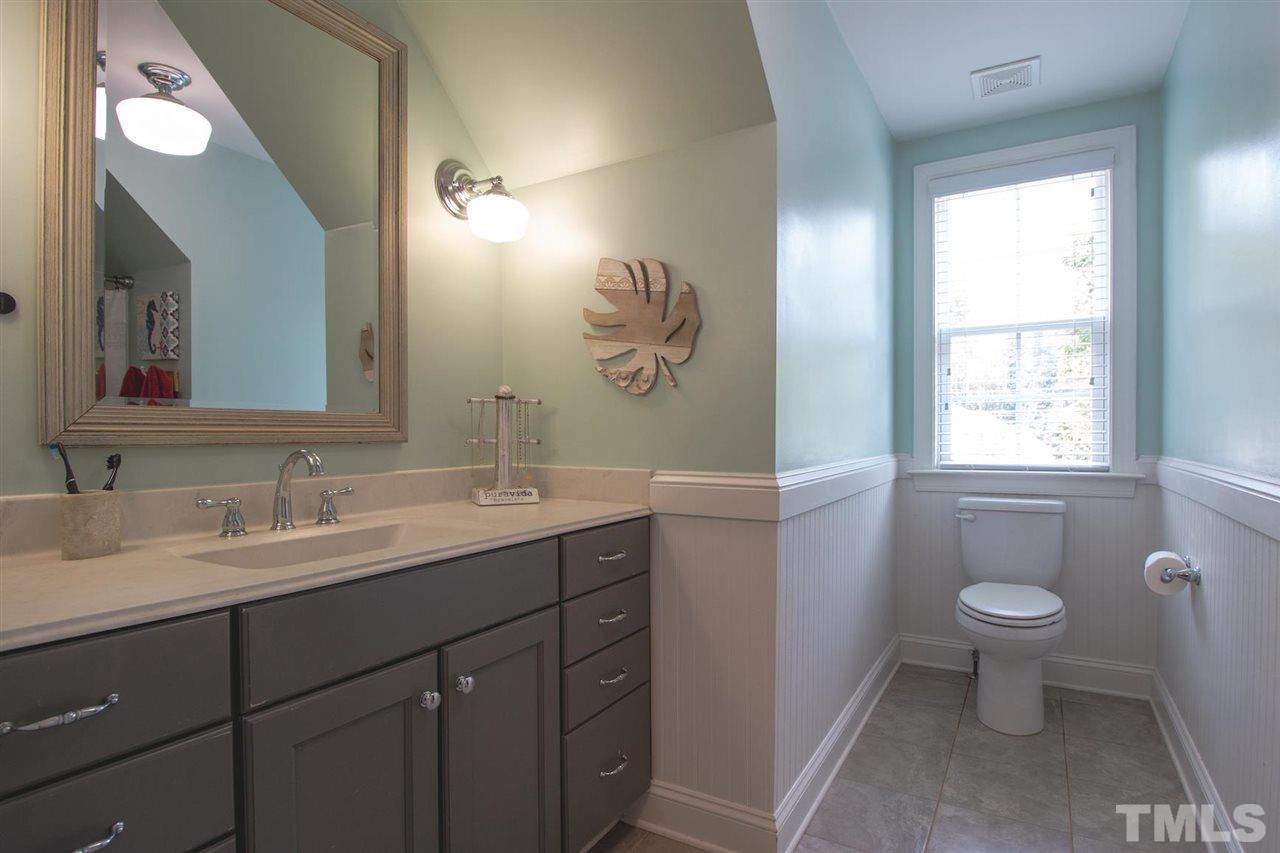 2637 Mt Vernon Church Road Raleigh, NC 27614 - Photo 12 of 15 a bathroom with a toilet sink and mirror