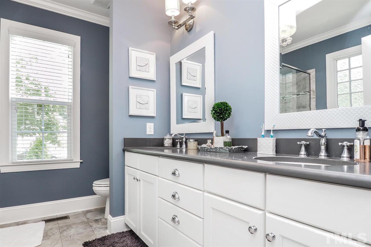 2637 Mt Vernon Church Road Raleigh, NC 27614 - Photo 5 of 15 a bathroom with a granite countertop sink mirror and window