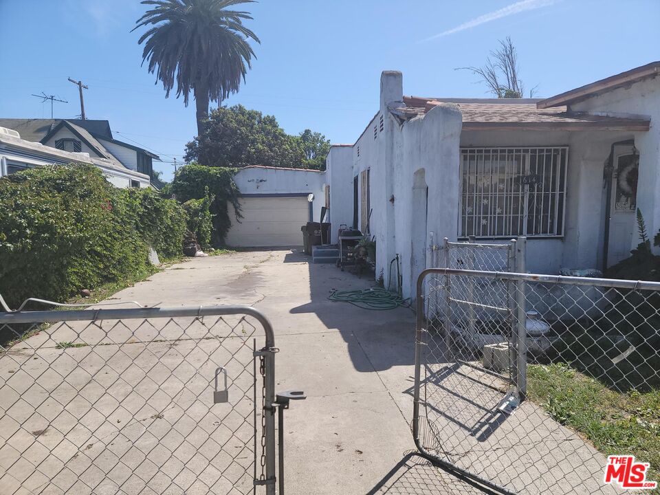 614 West Poplar Street Compton, CA 90220 - Photo 2 of 3 a spacious bathroom with a sink and a shower