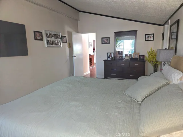 a view of a livingroom with a kitchen