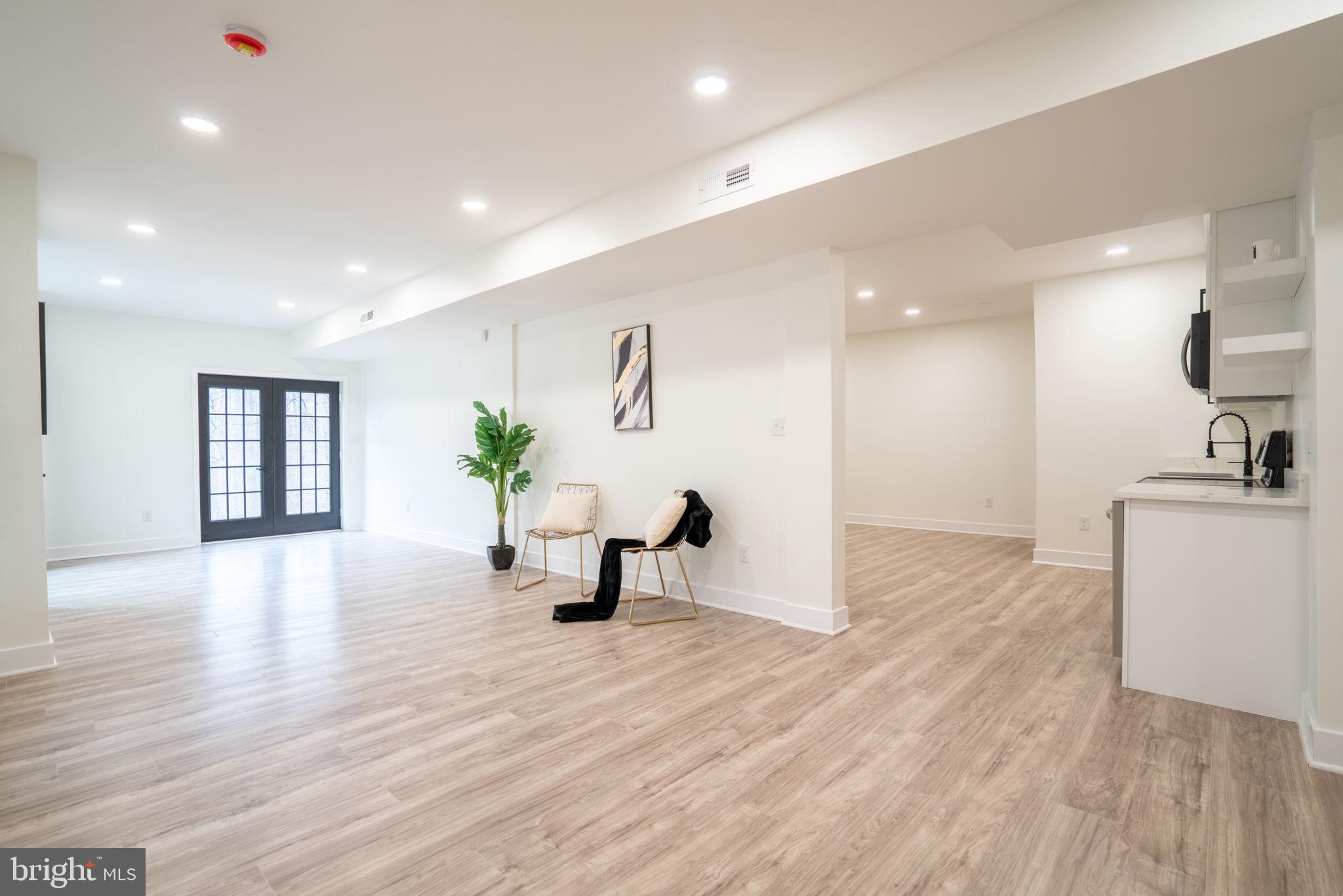 8261 Tinsley Place Culpeper, VA 22701 - Photo 62 of 80 a view of kitchen with furniture and wooden floor