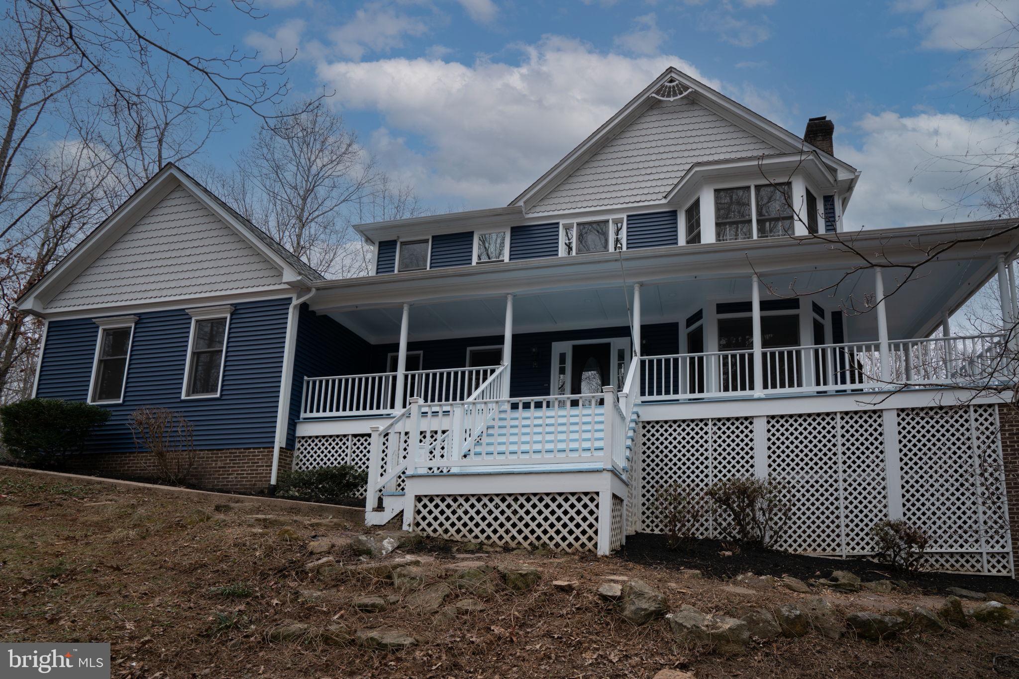 8261 Tinsley Place Culpeper, VA 22701 - Photo 71 of 80 a front view of a house with a garden