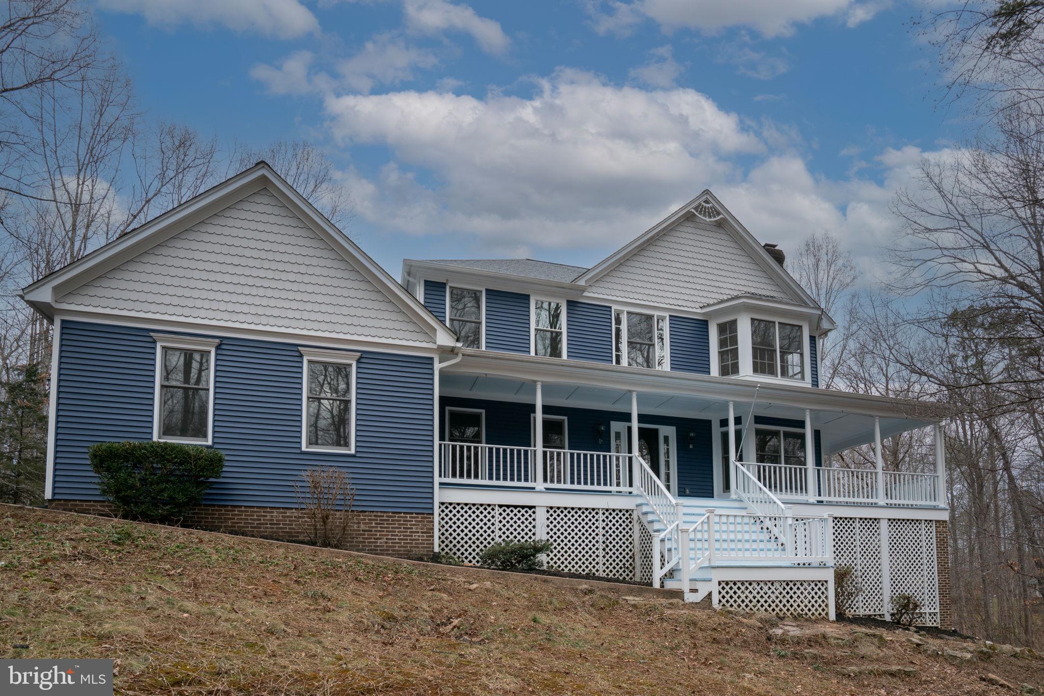8261 Tinsley Place Culpeper, VA 22701 - Photo 72 of 80 a front view of a house with a yard