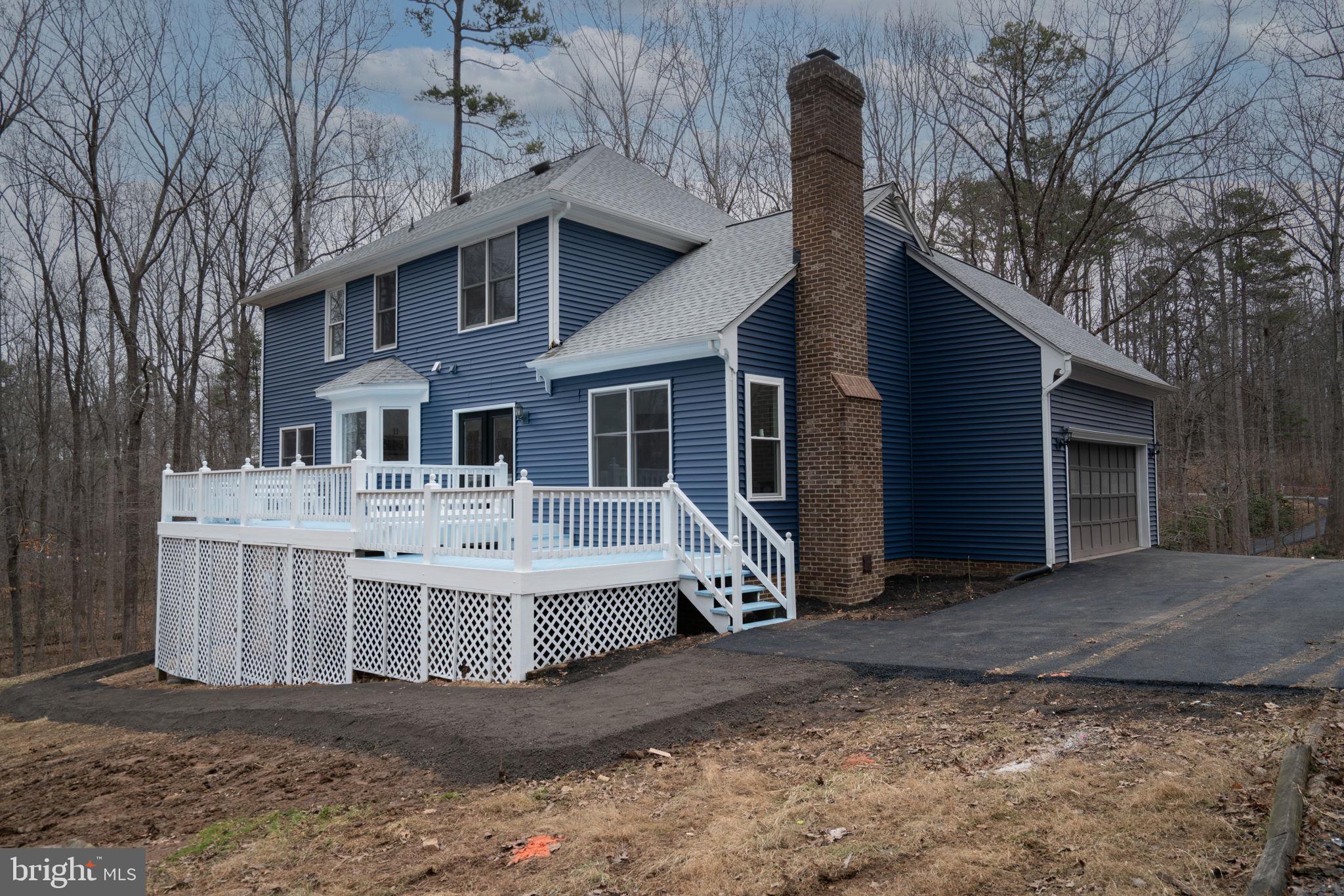 8261 Tinsley Place Culpeper, VA 22701 - Photo 73 of 80 a front view of a house with garage