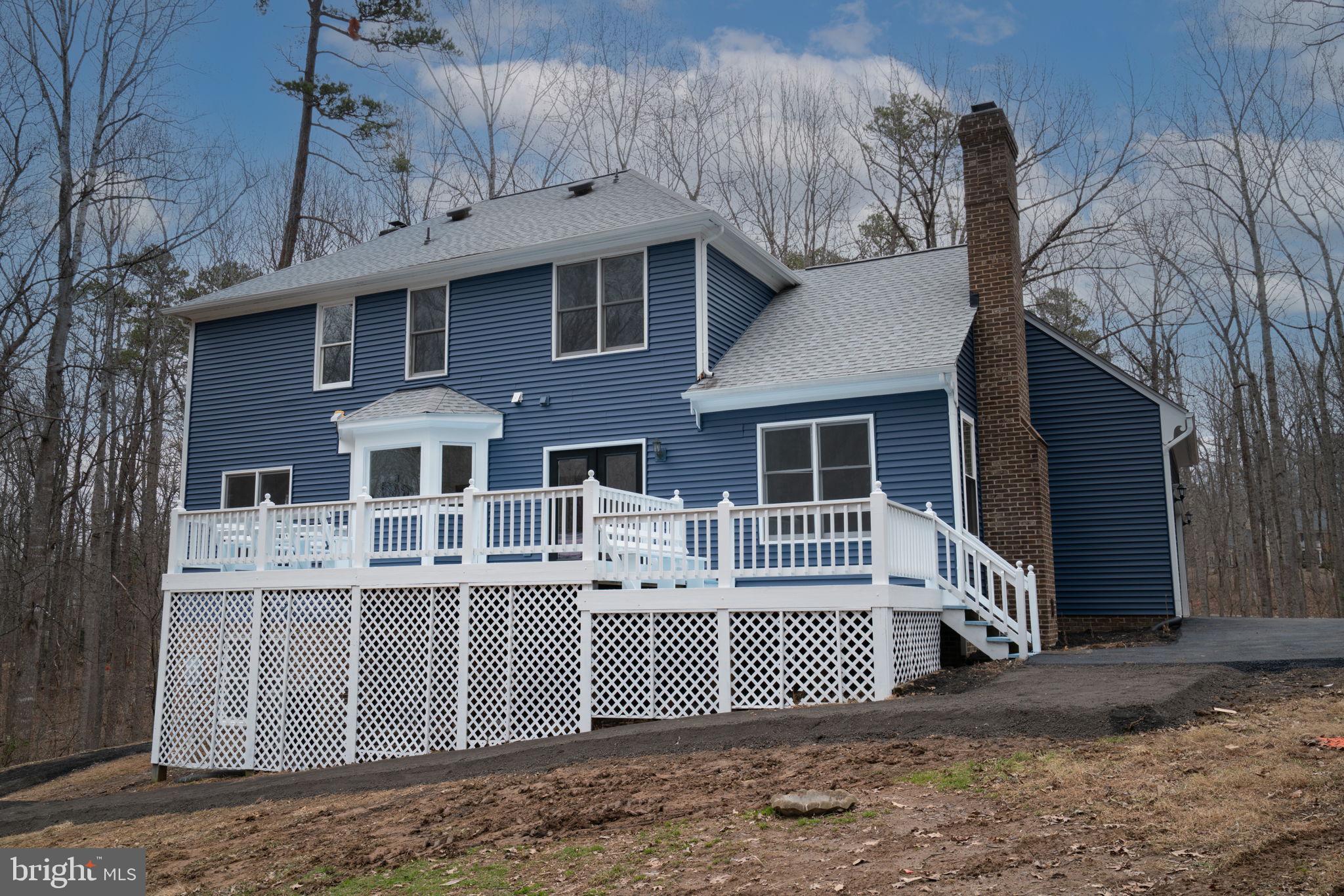 8261 Tinsley Place Culpeper, VA 22701 - Photo 75 of 80 a front view of a house with a garage
