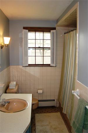 29 Holly Road Reading, MA 01867 - Photo 16 of 23 a bathroom with a sink toilet and shower