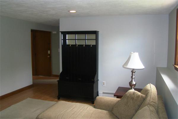 29 Holly Road Reading, MA 01867 - Photo 18 of 23 a bedroom with a bed and a closet