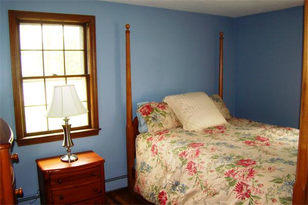 29 Holly Road Reading, MA 01867 - Photo 10 of 23 a bedroom with a bed and a window