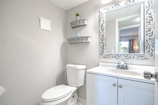 a view of a balcony with yard