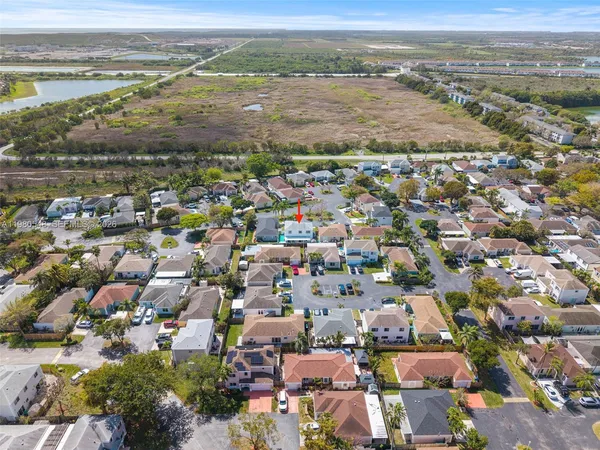 an aerial view of a city with lots of residential buildings