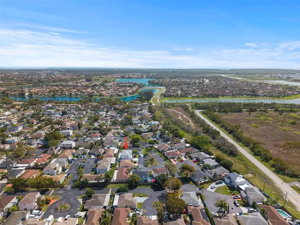 an aerial view of a city with lots of residential buildings