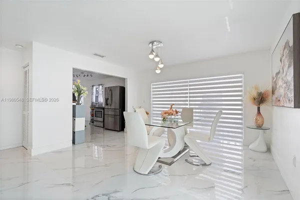 a dining room with furniture