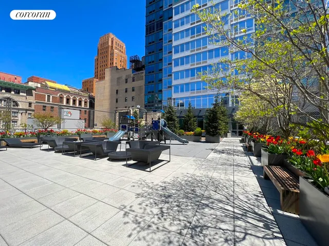 a view of a building with sitting area