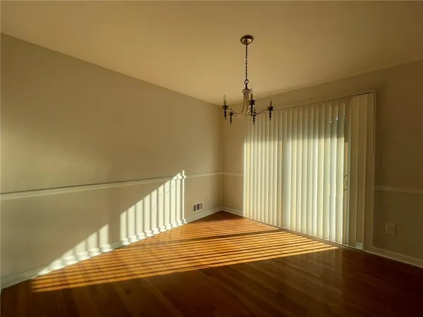 a view of a room with a chandelier