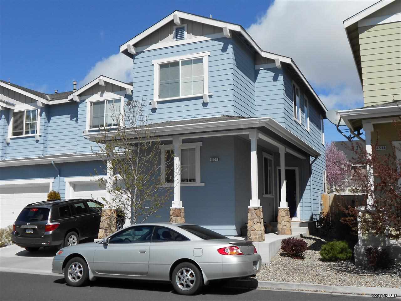 a car parked in front of a house