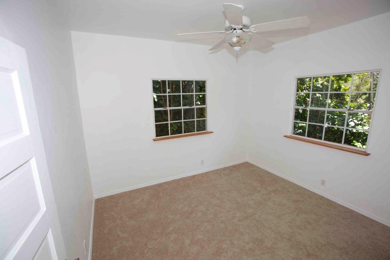 333 West Kuiaha Road Haiku, HI 96708 - Photo 8 of 21 an empty room with windows and fan