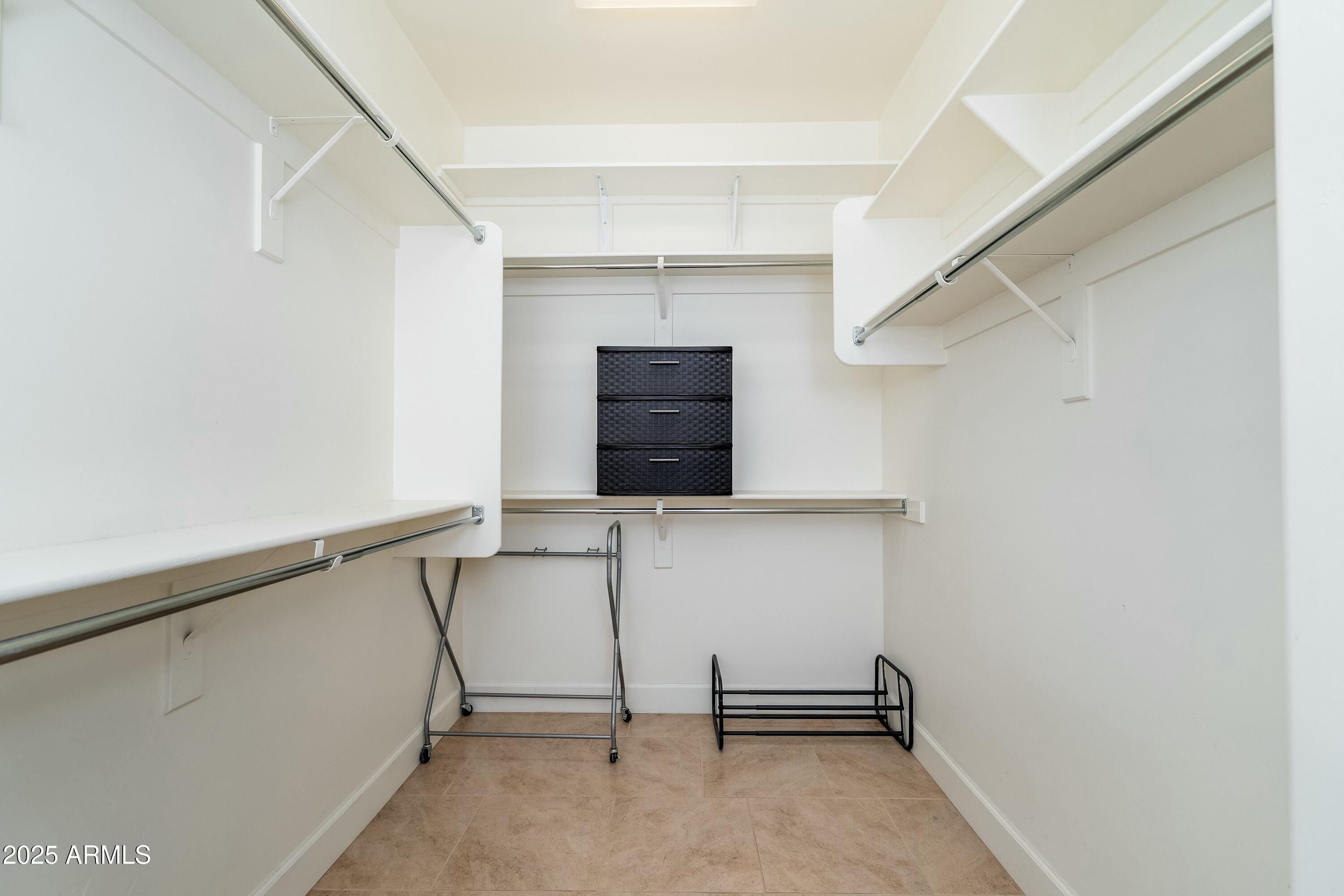 17972 East Silver Sage Lane Rio Verde, AZ 85263 - Photo 21 of 80 a view of a room with rack on the wall