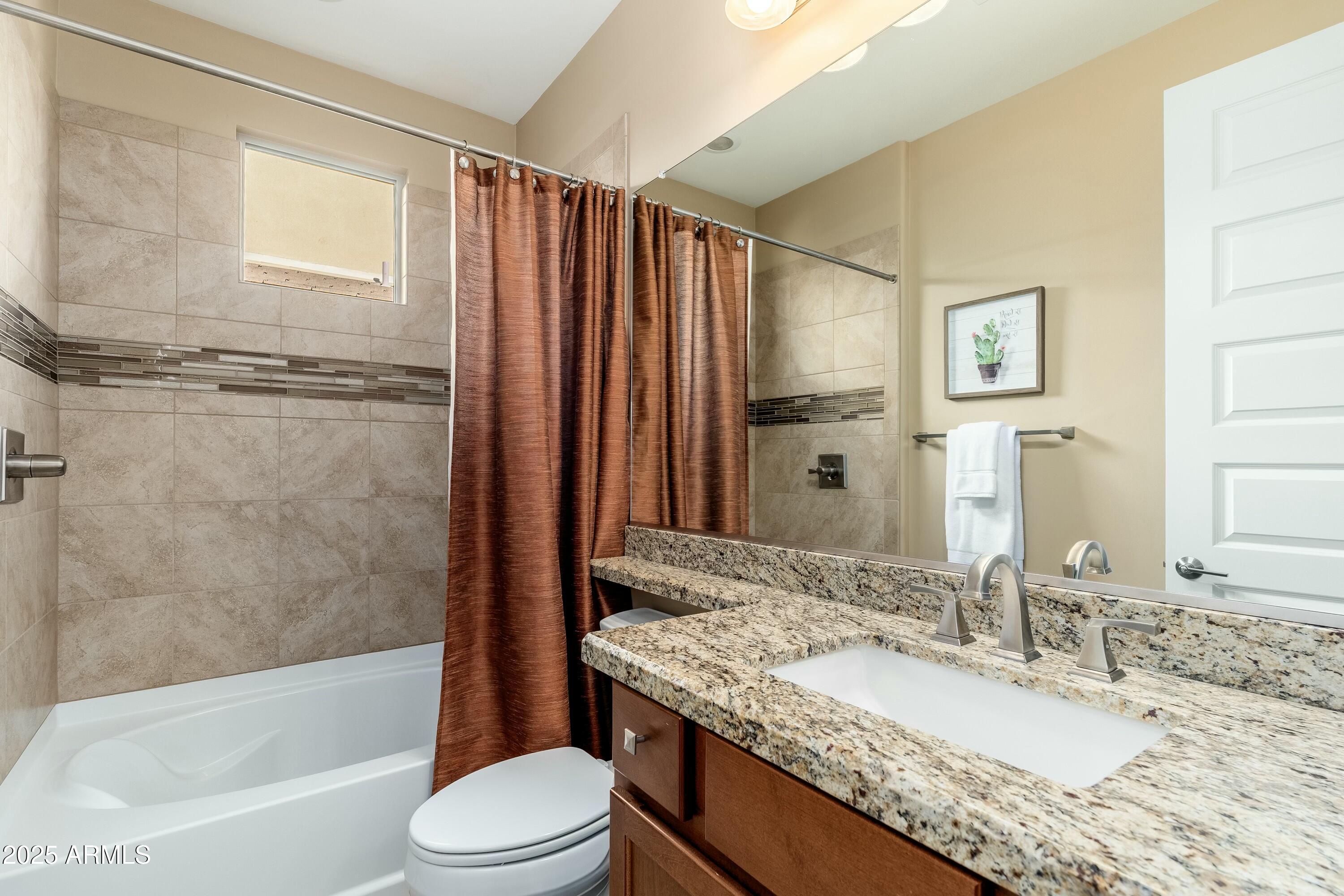 17972 East Silver Sage Lane Rio Verde, AZ 85263 - Photo 23 of 80 a bathroom with a granite countertop sink toilet and shower