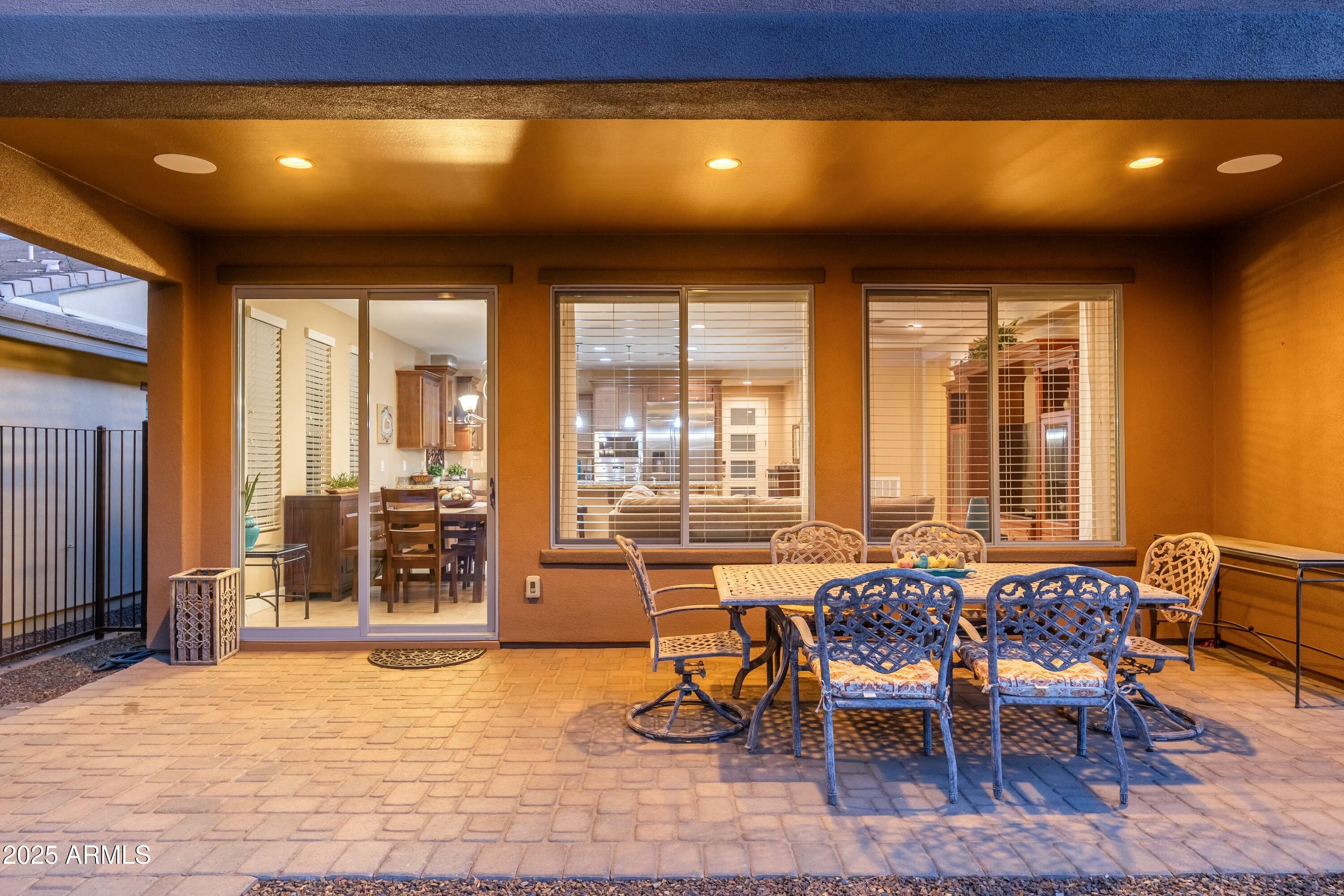 17972 East Silver Sage Lane Rio Verde, AZ 85263 - Photo 33 of 80 a dining room with furniture and wooden floor