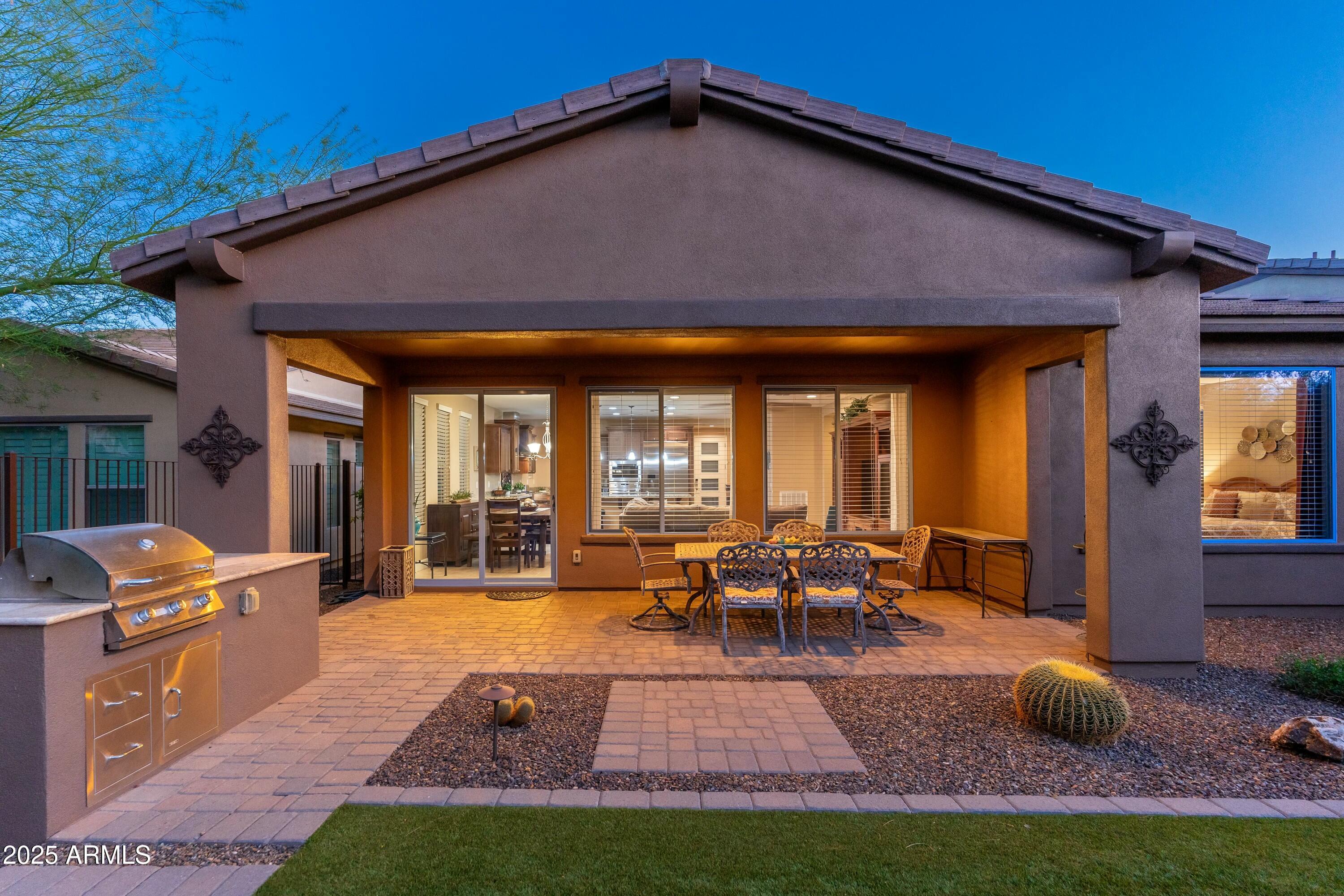 17972 East Silver Sage Lane Rio Verde, AZ 85263 - Photo 35 of 80 a view of outdoor space yard deck patio and outdoor kitchen