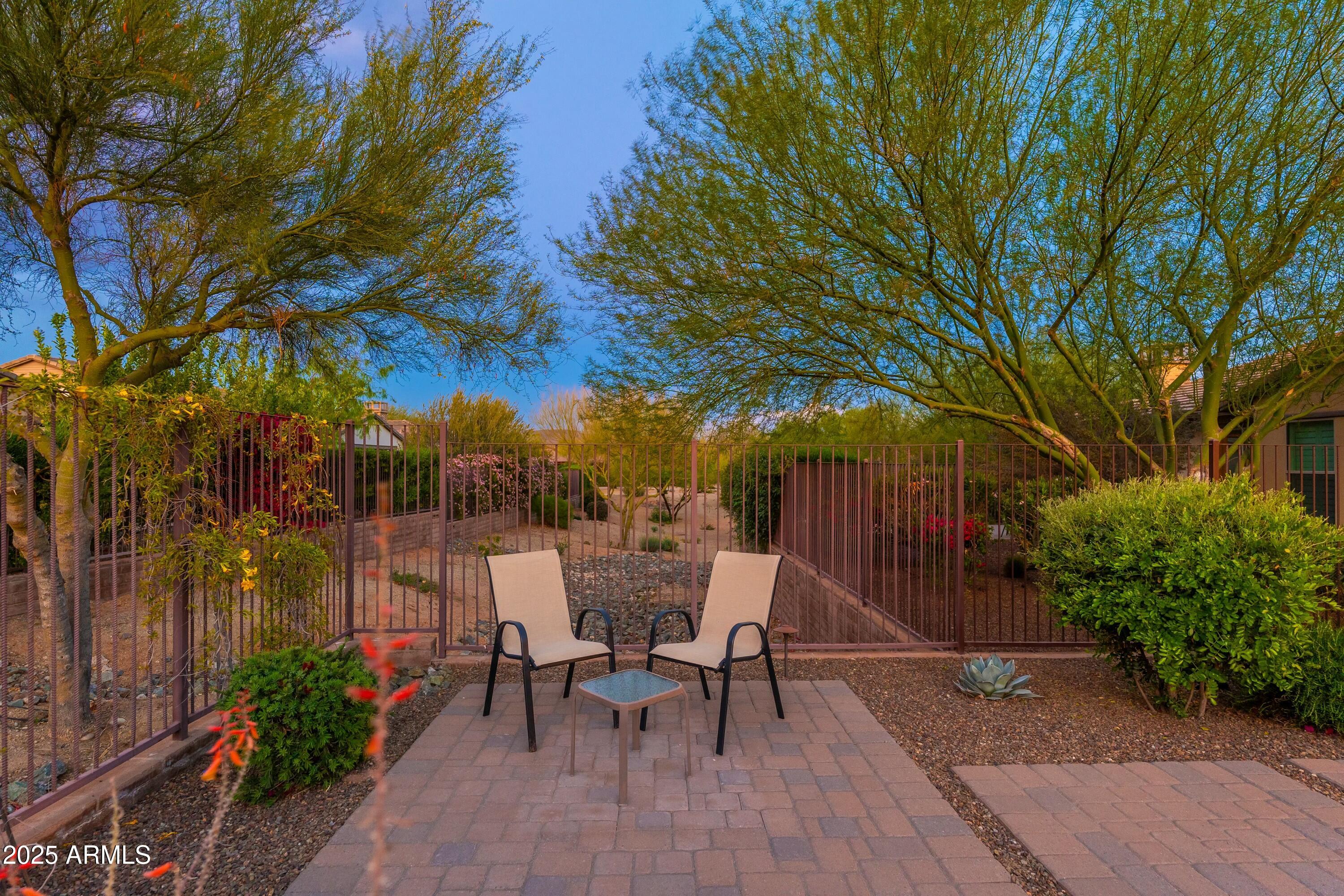 17972 East Silver Sage Lane Rio Verde, AZ 85263 - Photo 37 of 80 a view of a tables and chairs on fire pit