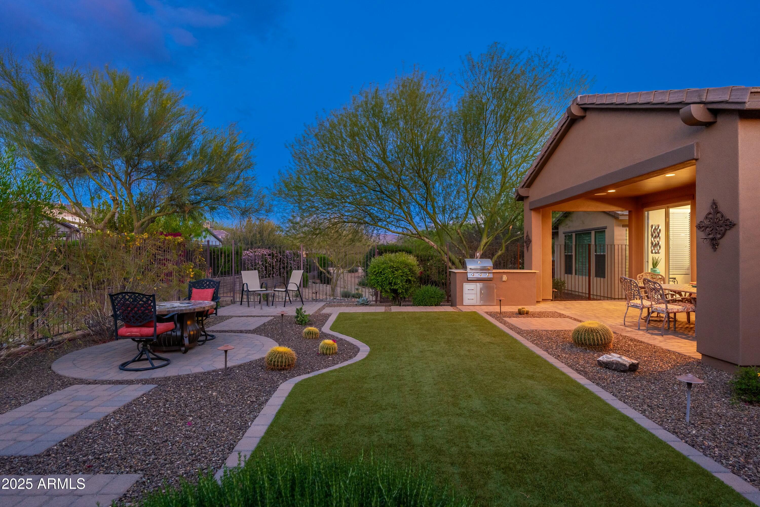 17972 East Silver Sage Lane Rio Verde, AZ 85263 - Photo 41 of 80 a view of a house with backyard and sitting area
