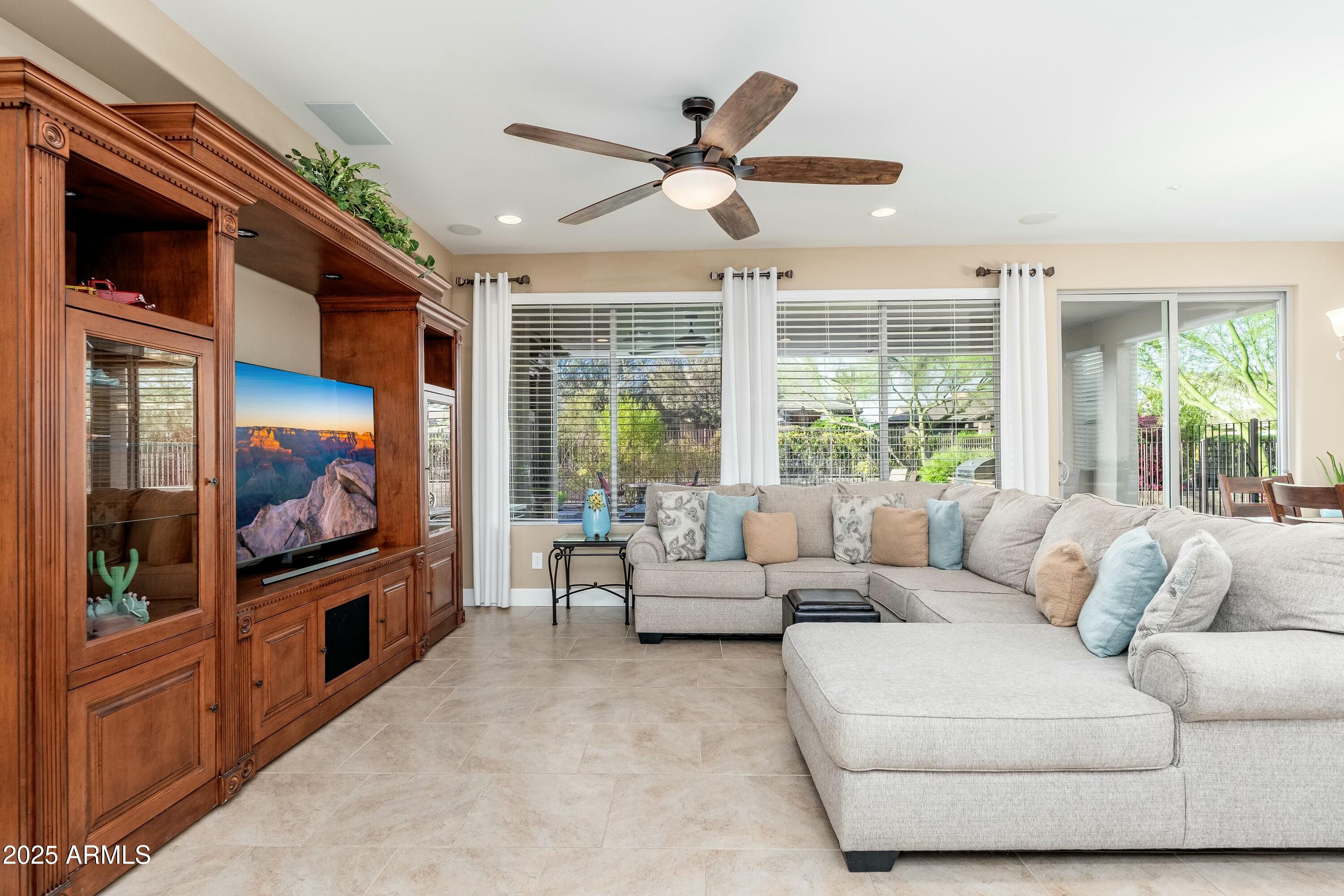 17972 East Silver Sage Lane Rio Verde, AZ 85263 - Photo 6 of 80 a living room with furniture and a large window