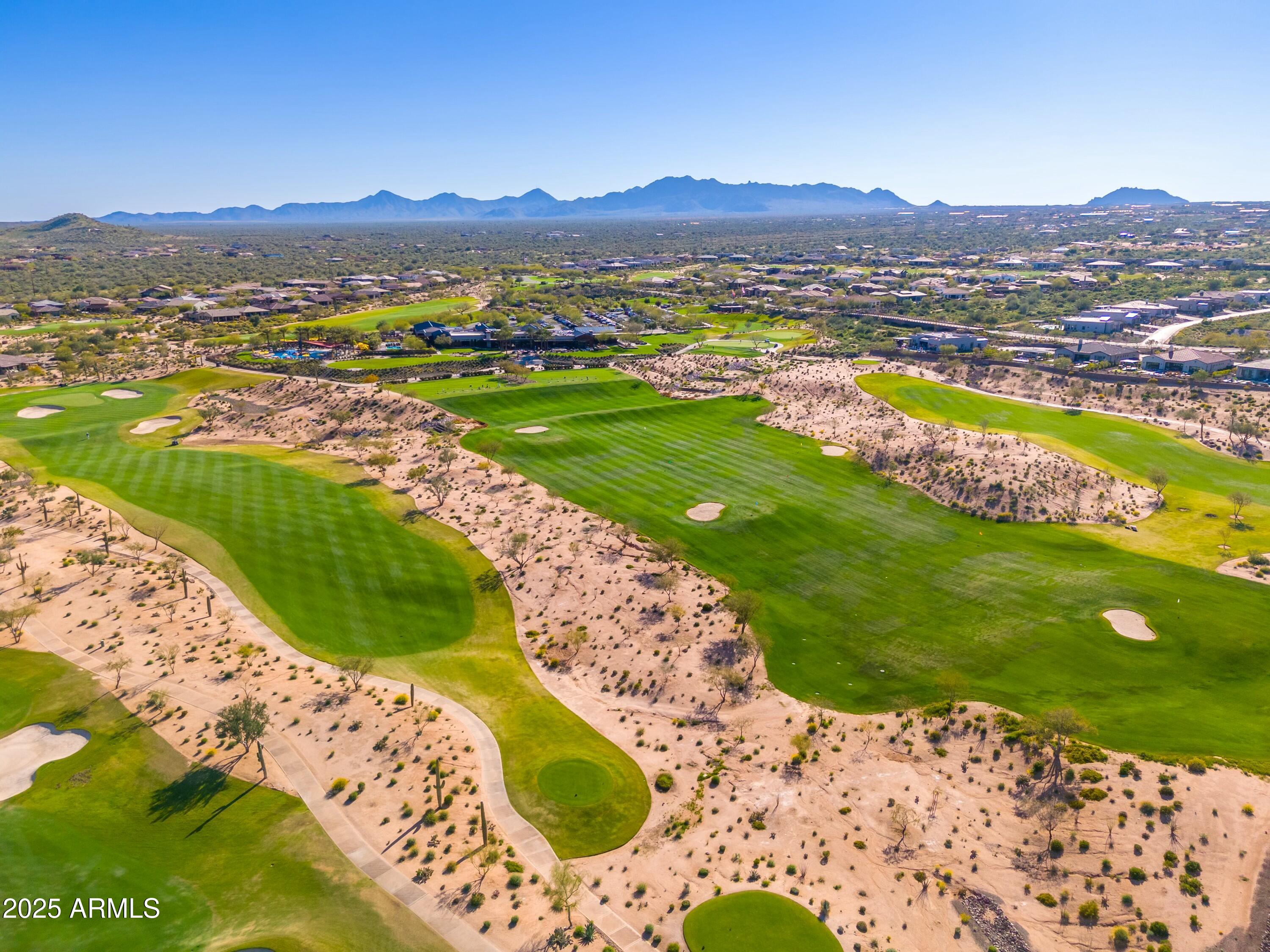 17972 East Silver Sage Lane Rio Verde, AZ 85263 - Photo 74 of 80 a view of a city with mountains in the background