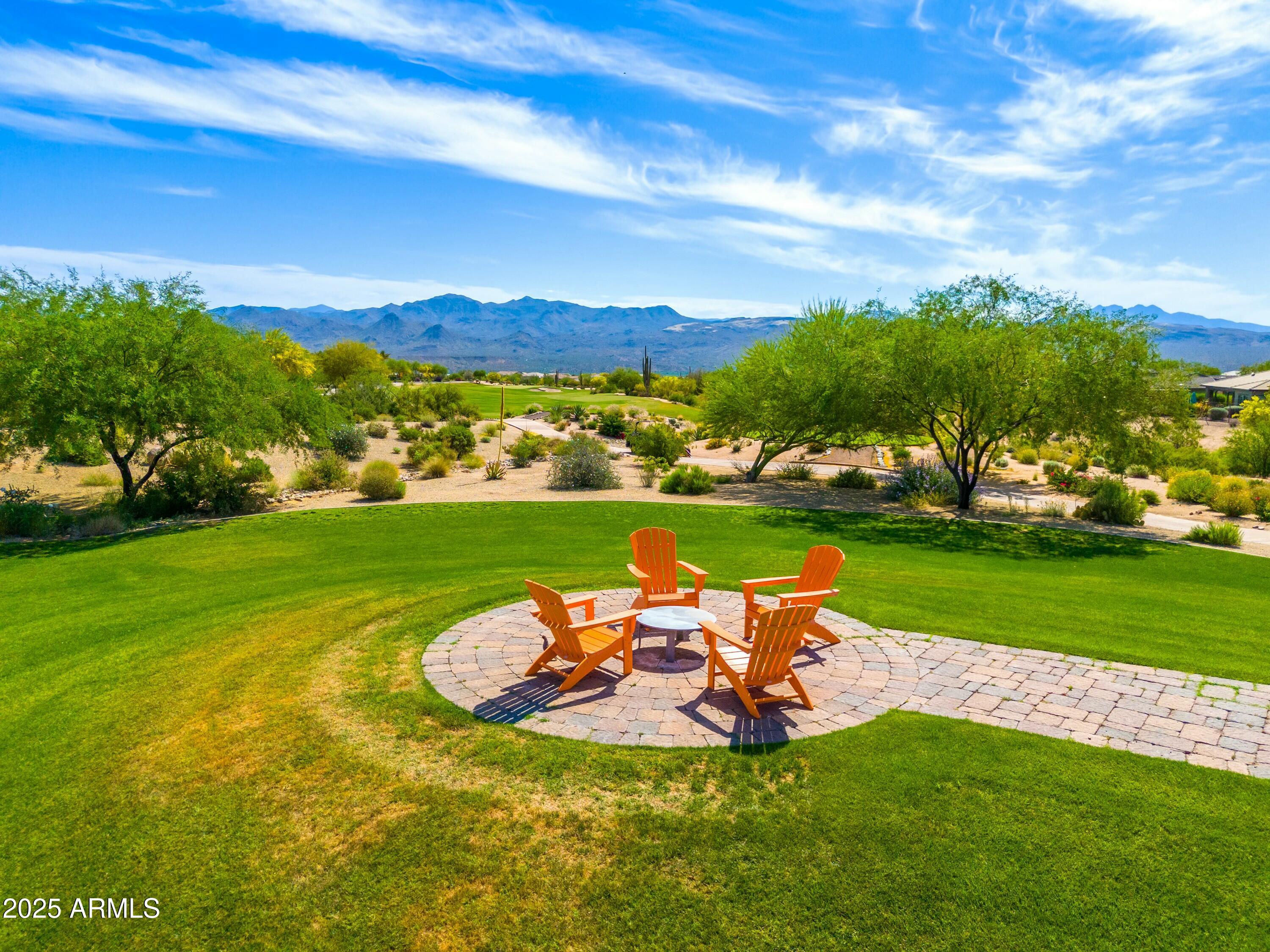 17972 East Silver Sage Lane Rio Verde, AZ 85263 - Photo 78 of 80 a view of a garden with lawn chairs