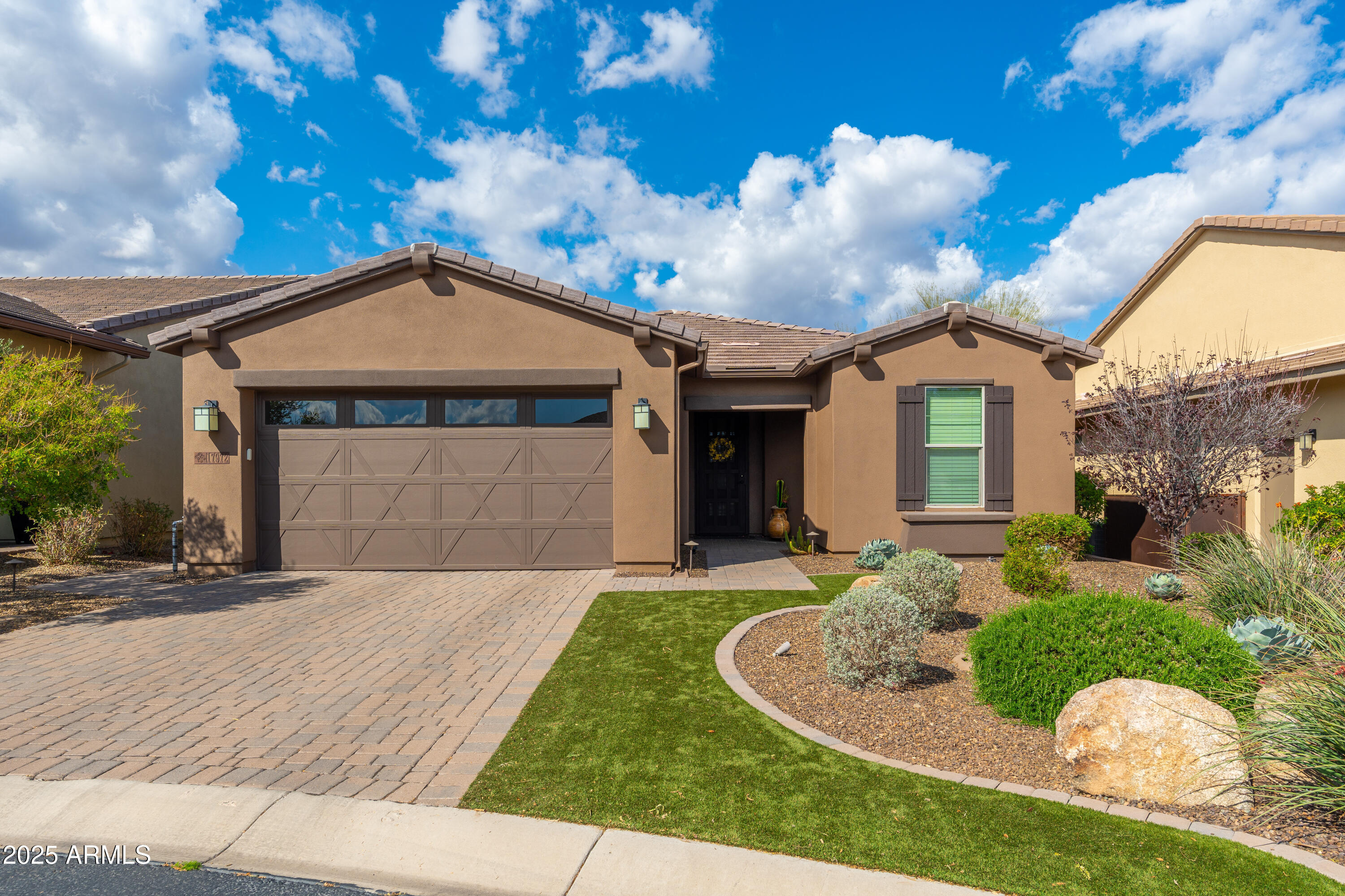 17972 East Silver Sage Lane Rio Verde, AZ 85263 - Photo 80 of 80 a front view of a house with a yard and garage