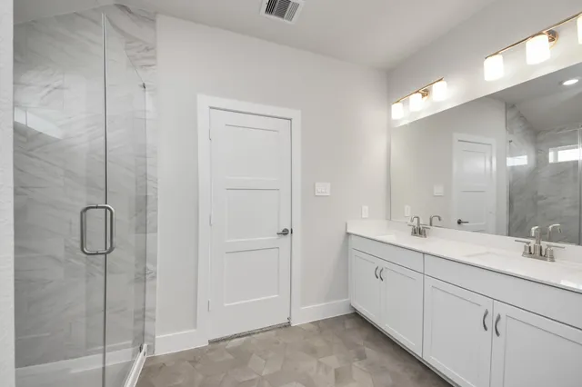 a view of a backyard with a garden and plants