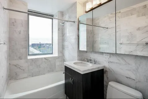 a bathroom with a sink and a bathtub